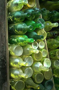 Mildred Howard, detail of Memory Garden Phase 1, 1990, 4000 bottles & mixed media. photo 